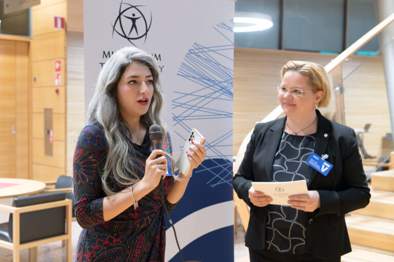 Photo of Sanaz Zarabi, a Doctoral Researcher at Aalto University and Minna Palmroth, Chair of Board of Technology Academy Finland